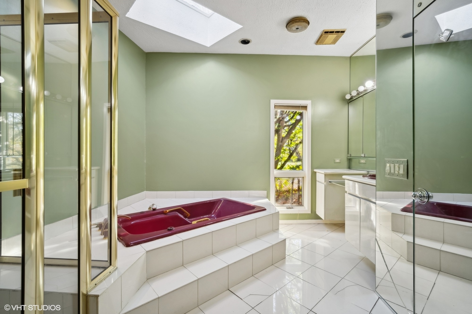 800 Edgewood Lane Glenview, IL 60025 - Photo 17 of 20 a bedroom with a bed and a chandelier