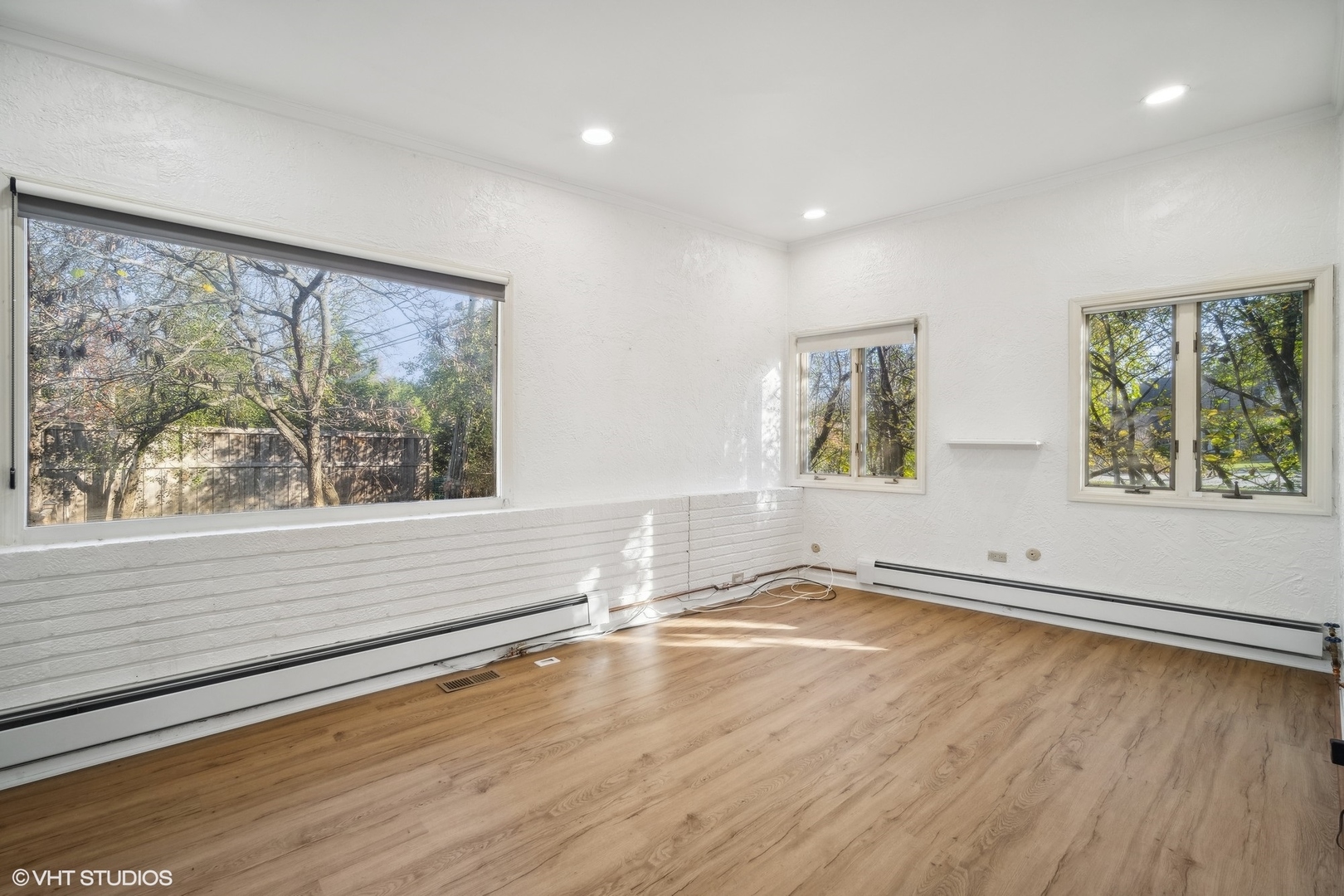 800 Edgewood Lane Glenview, IL 60025 - Photo 18 of 20 a view of empty room with wooden floor and fan