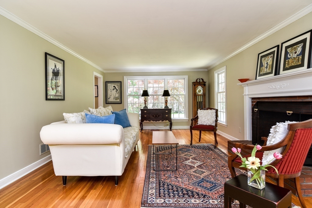 114 Hunters Ridge Road Concord, MA 01742 - Photo 6 of 38 a living room with furniture and a fireplace
