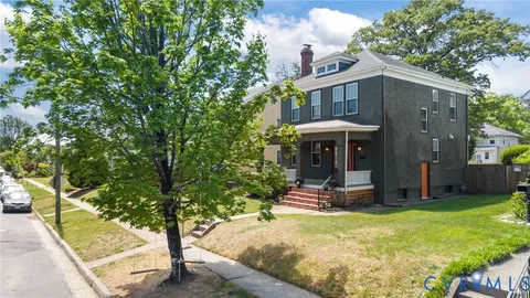 a view of a building from a balcony