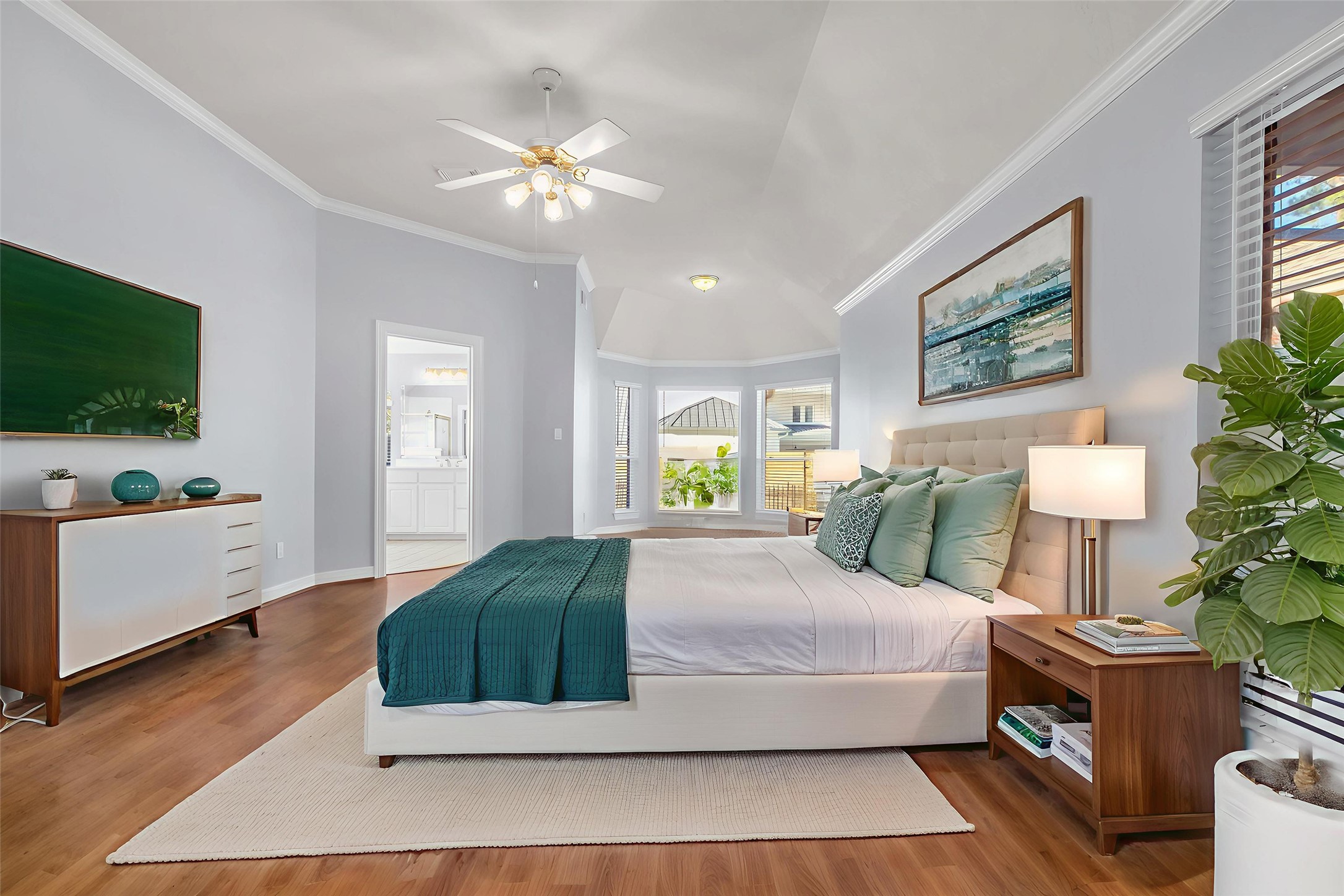 35 West Pines Drive Montgomery, TX 77356 - Photo 21 of 30 a bedroom with a large bed and a flat screen tv