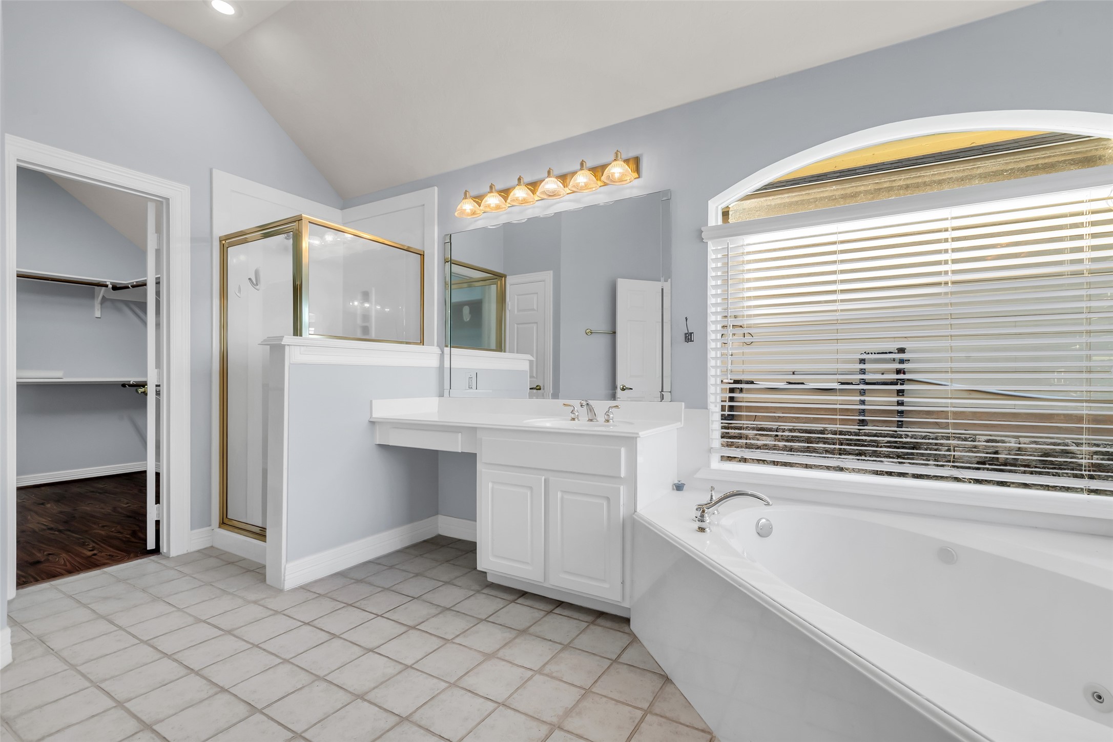 35 West Pines Drive Montgomery, TX 77356 - Photo 24 of 30 a bathroom with a bathtub a sink and a shower