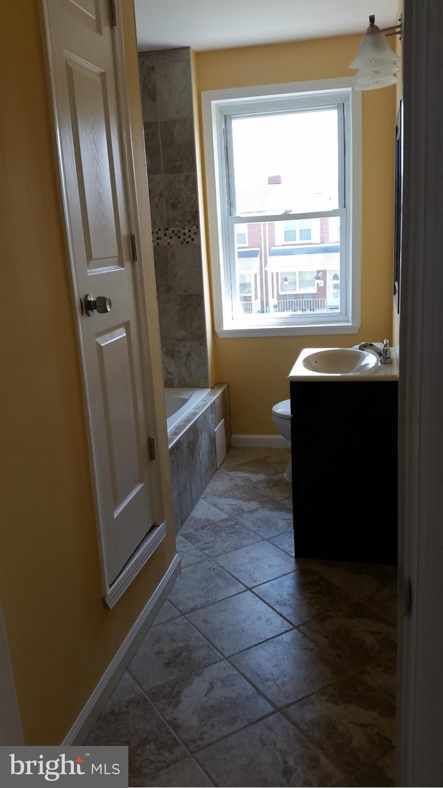 1228 Silverthorne Road Baltimore, MD 21239 - Photo 11 of 19 Bath (Master)