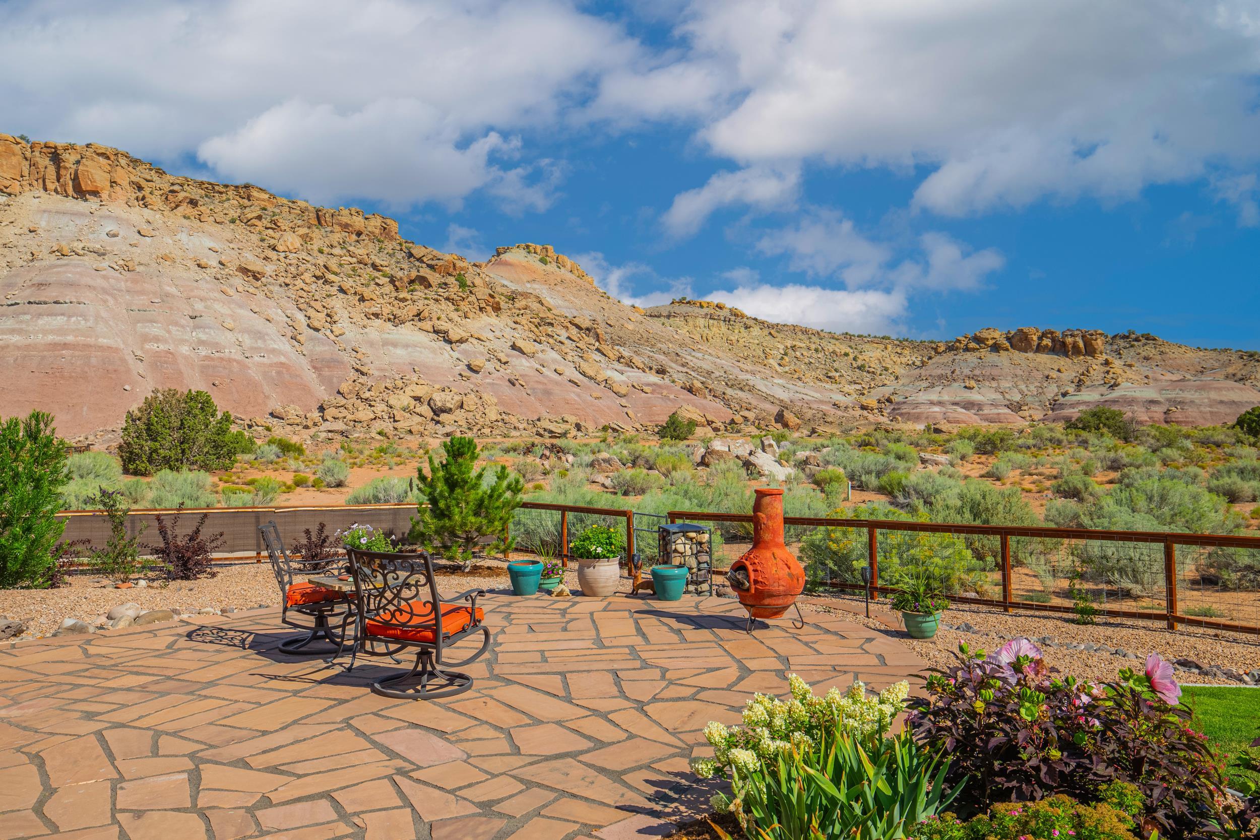 326 Red Point Road Grand Junction, CO 81507 - Photo 21 of 37 a view of a terrace with a bench