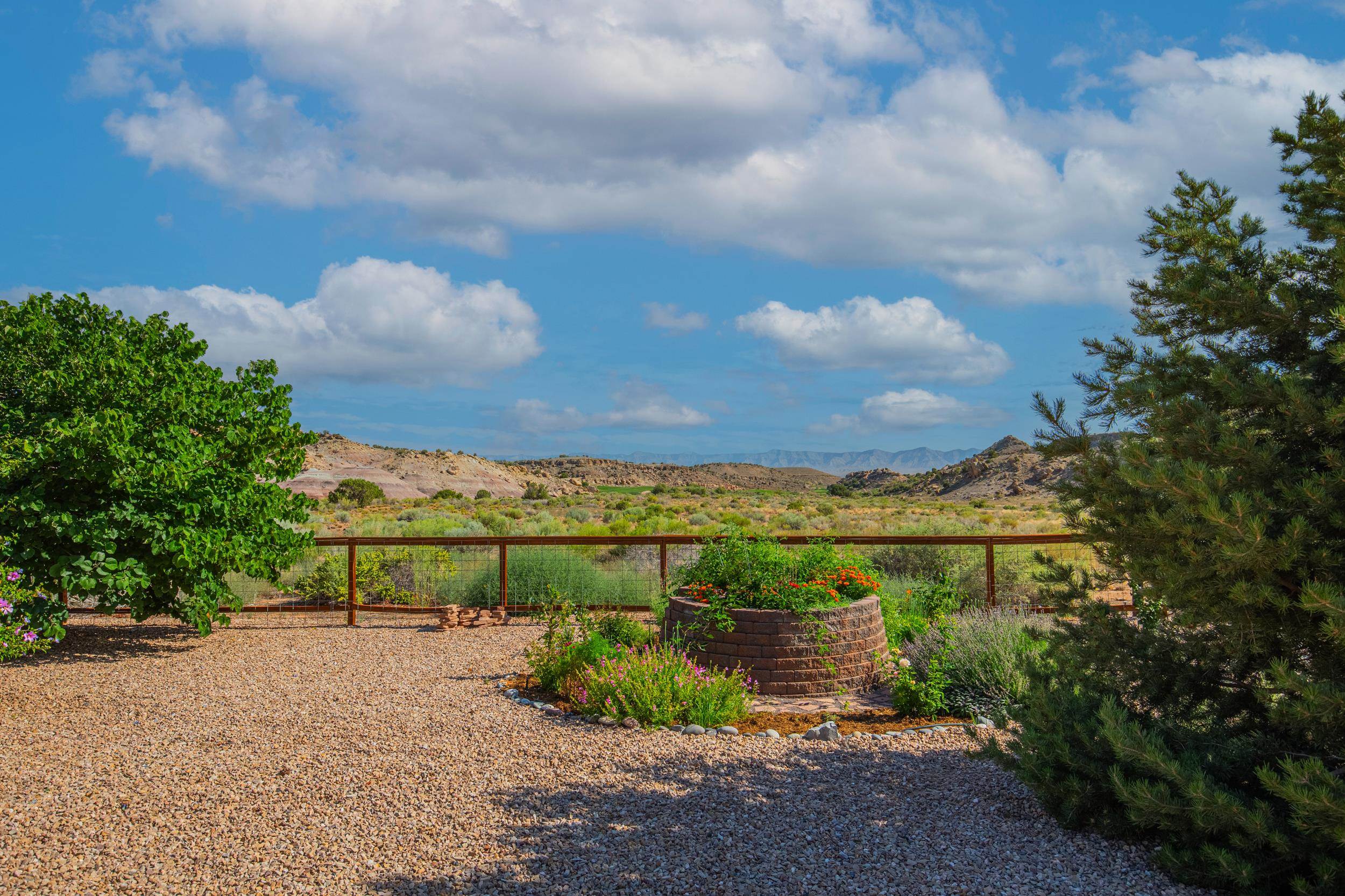 326 Red Point Road Grand Junction, CO 81507 - Photo 22 of 37 a view of a pathway both side of building