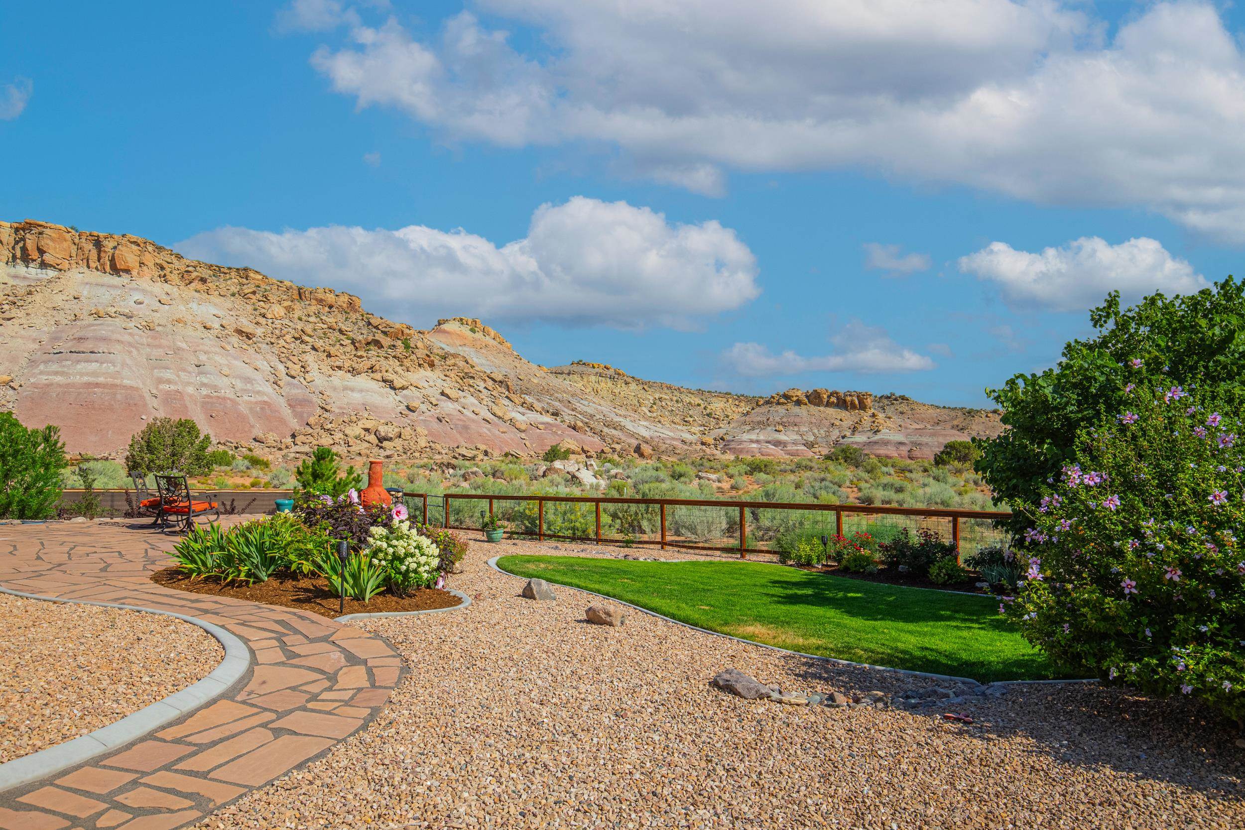 326 Red Point Road Grand Junction, CO 81507 - Photo 23 of 37 a view of a pathway with a garden in back