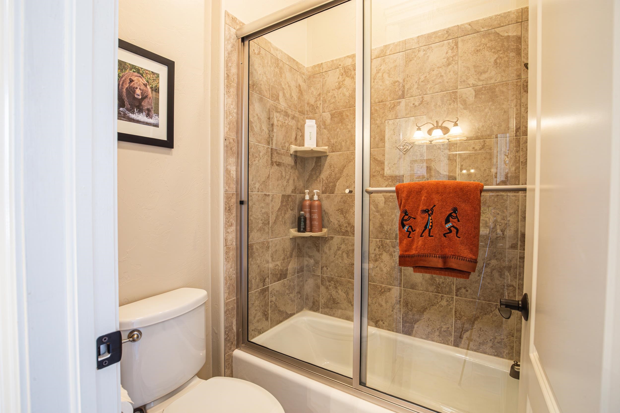 326 Red Point Road Grand Junction, CO 81507 - Photo 10 of 37 a bathroom with a shower and toilet