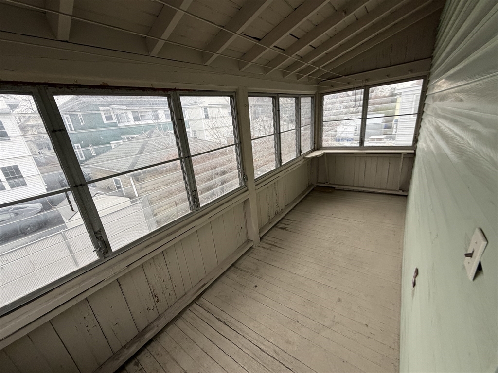 44 Varnum Street, Unit 2 Arlington, MA 02474 - Photo 16 of 19 a view of an empty room with a window