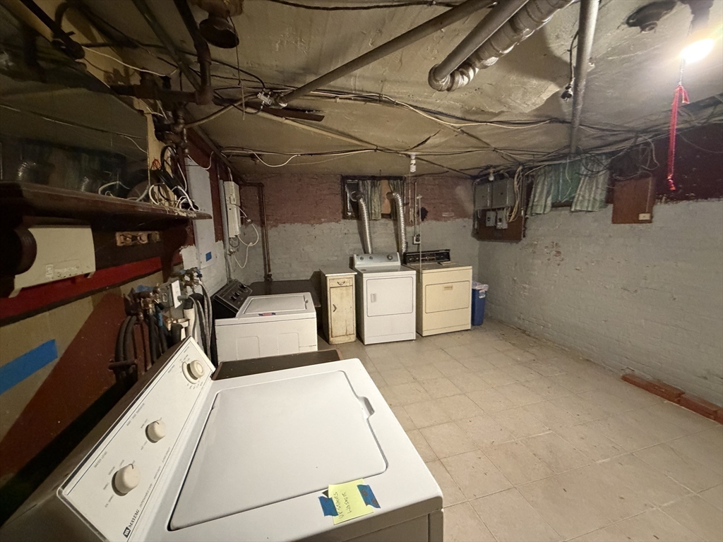 44 Varnum Street, Unit 2 Arlington, MA 02474 - Photo 18 of 19 a utility room with dryer and washer