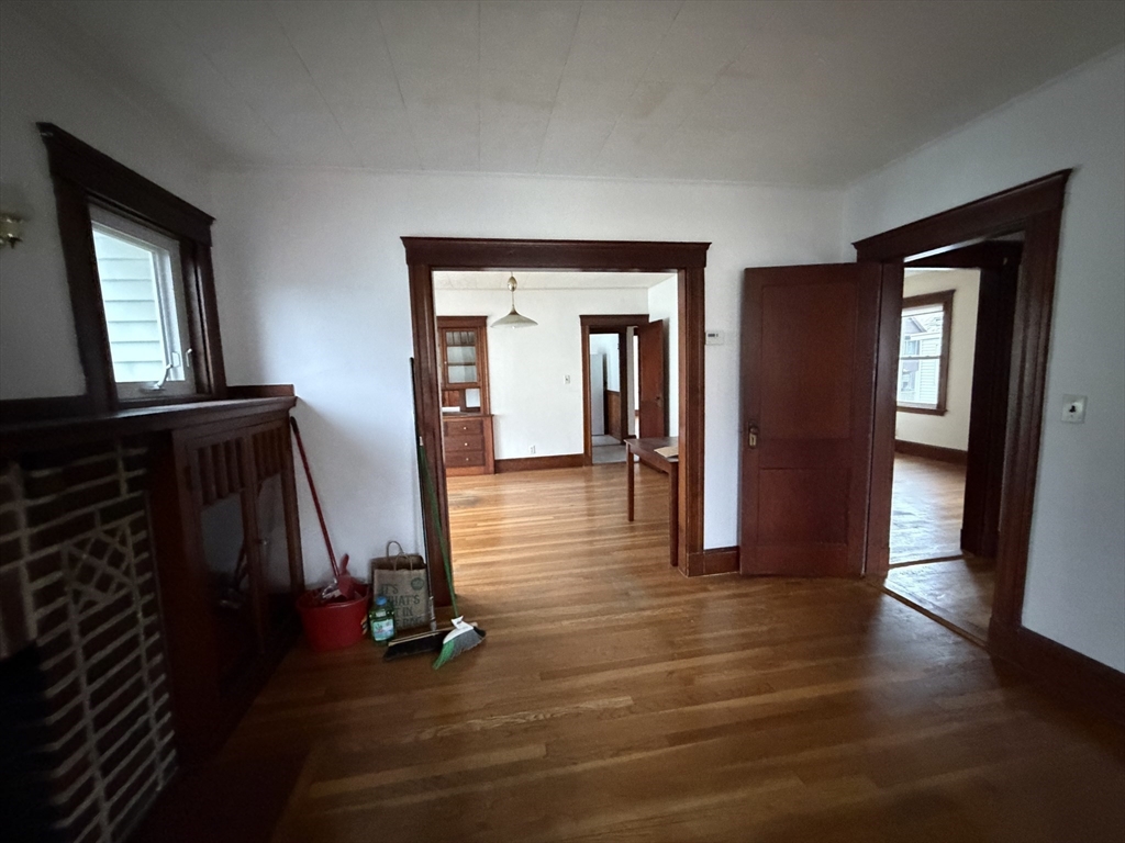 44 Varnum Street, Unit 2 Arlington, MA 02474 - Photo 3 of 19 a view of gallery with wooden floor