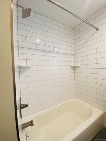a bathroom with a bathtub
