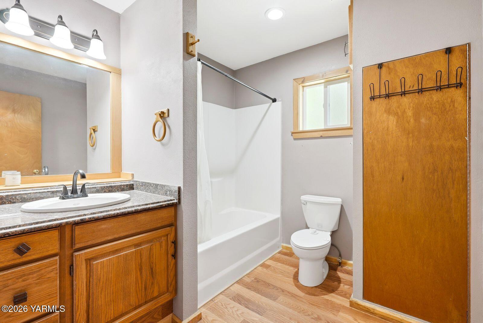 3780 Nile Road Naches, WA 98937 - Photo 12 of 43 a bathroom with a granite countertop sink toilet and shower