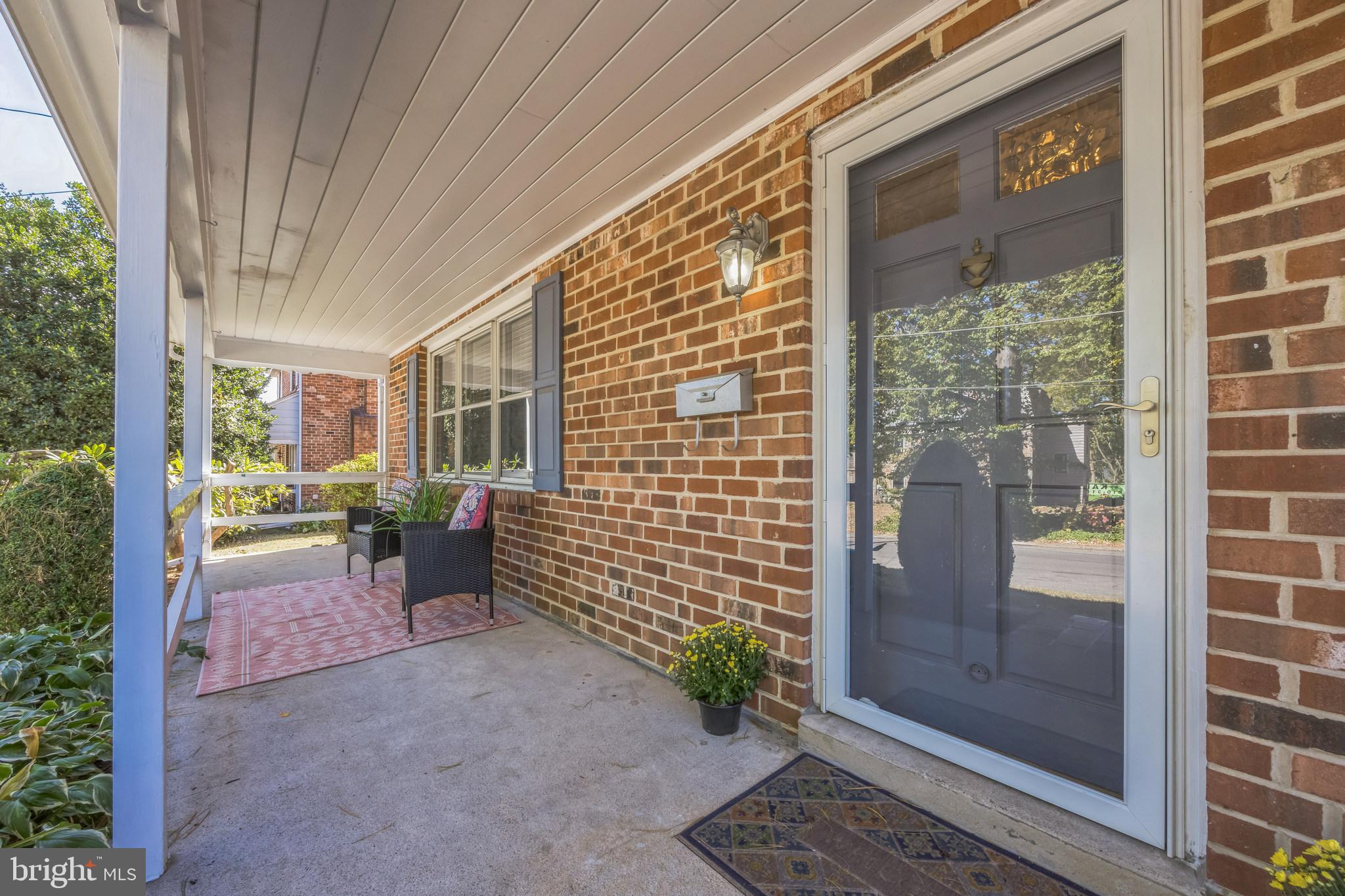110 Lynbrooke Road Springfield, PA 19064 - Photo 2 of 39 Covered front porch runs length of the home