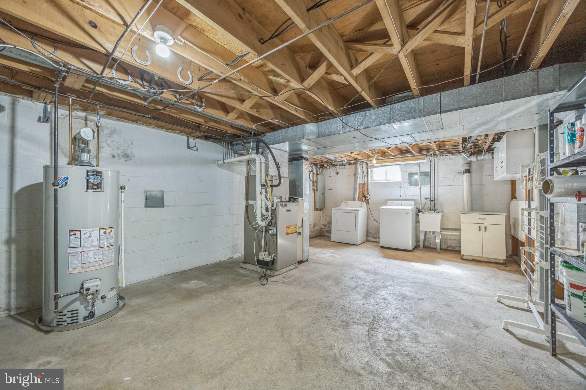 110 Lynbrooke Road Springfield, PA 19064 - Photo 30 of 39 Half is unfinished, with storage, laundry and util