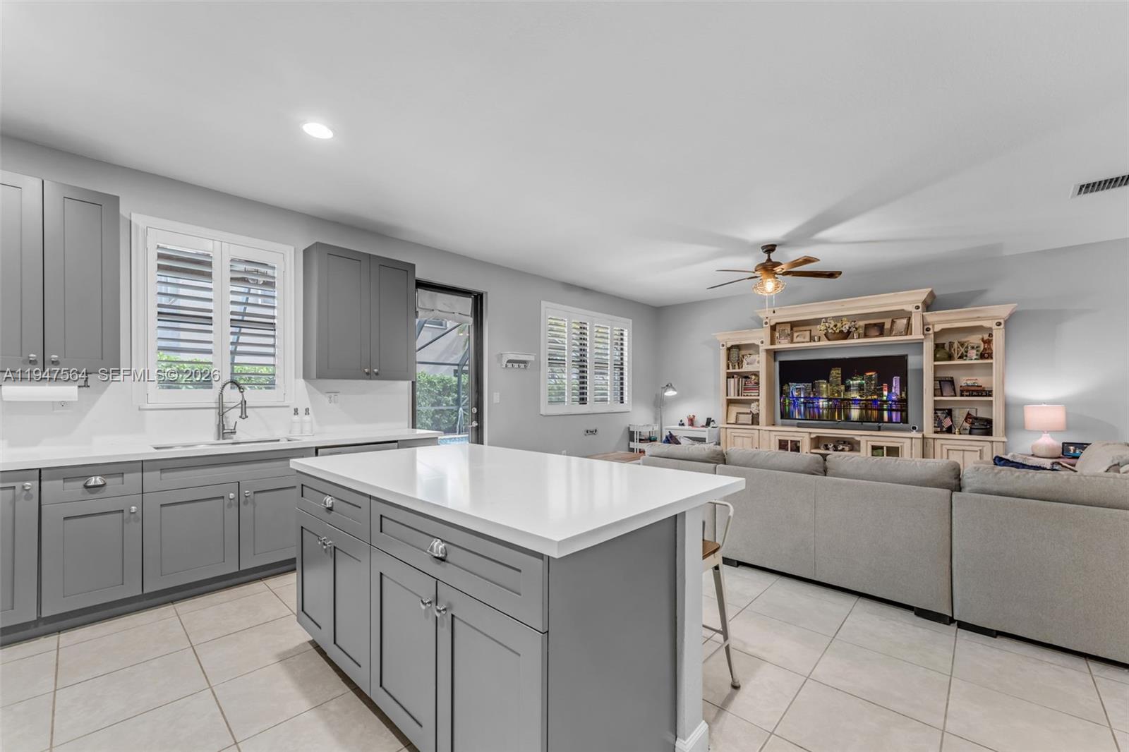 17475 Southwest 153rd Avenue Miami, FL 33187 - Photo 13 of 46 a kitchen with sink and cabinets