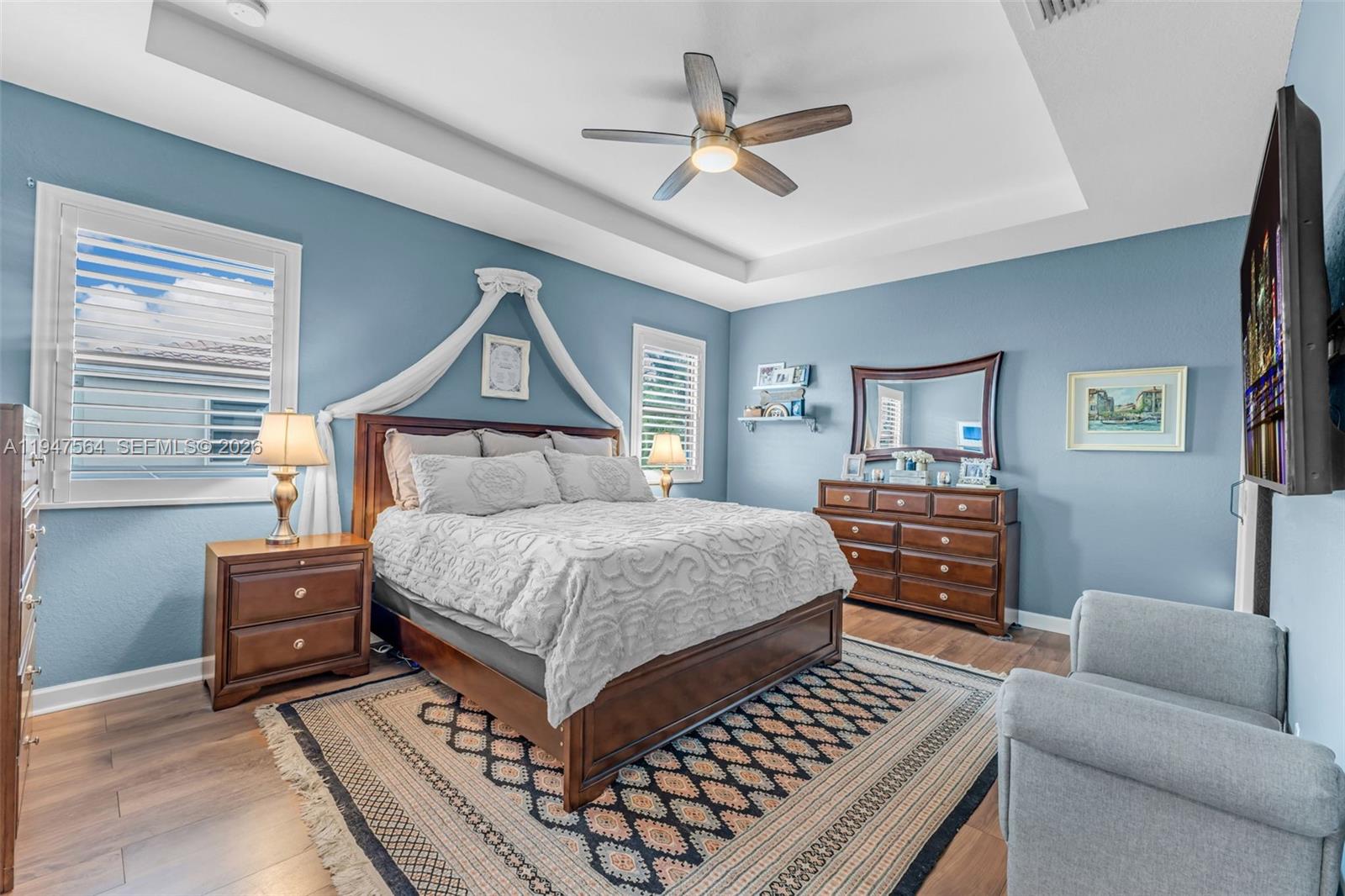 17475 Southwest 153rd Avenue Miami, FL 33187 - Photo 21 of 46 a bedroom with a bed furniture and a window