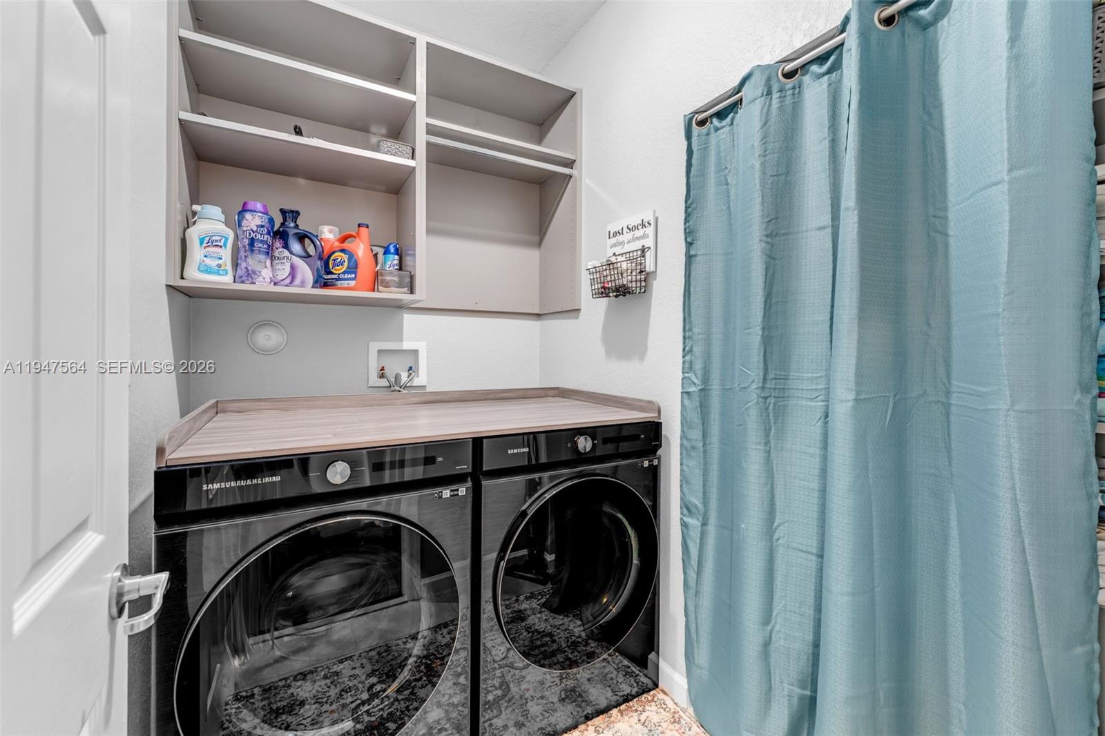 17475 Southwest 153rd Avenue Miami, FL 33187 - Photo 26 of 46 a utility room with dryer and washer