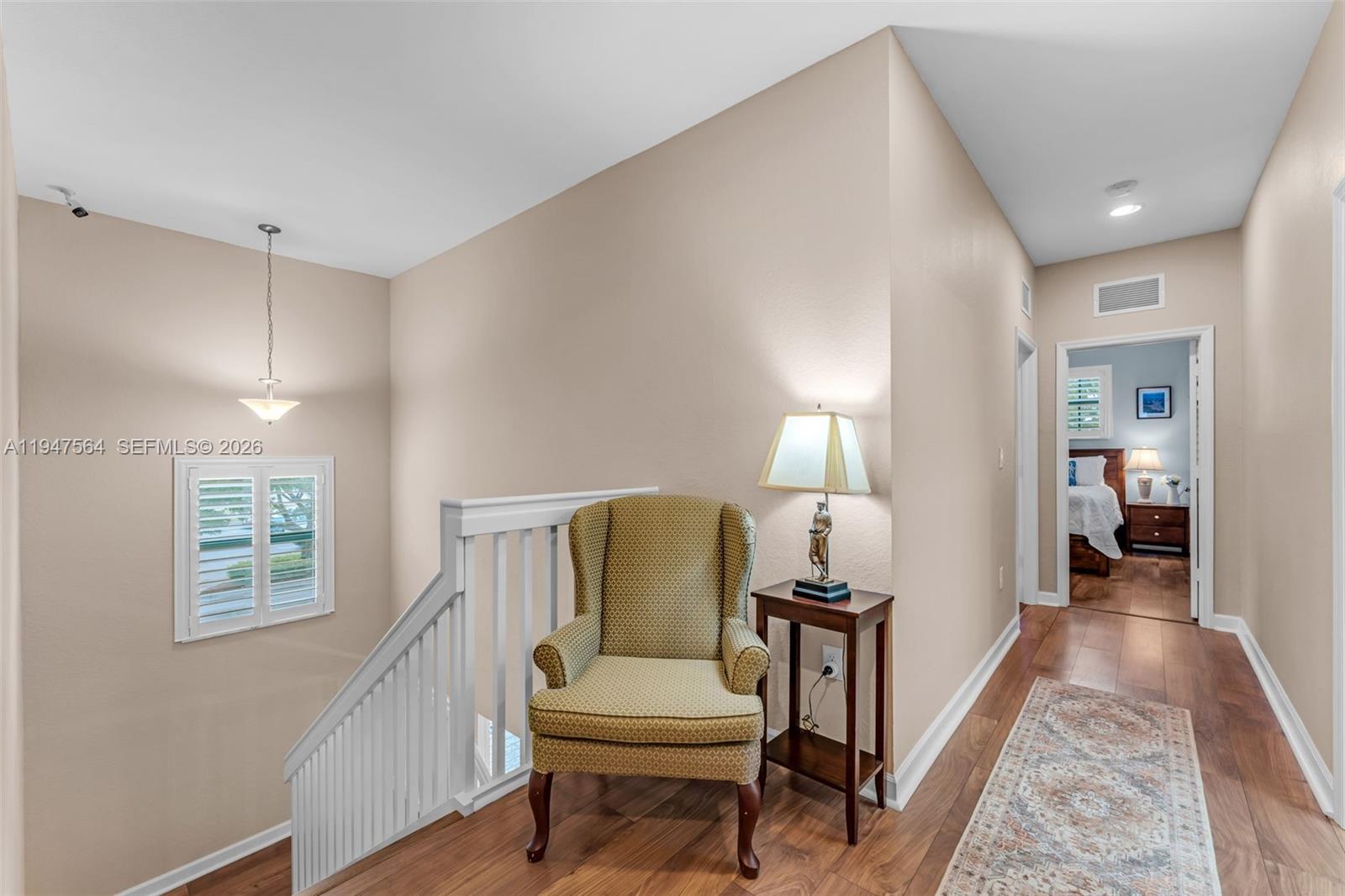 17475 Southwest 153rd Avenue Miami, FL 33187 - Photo 27 of 46 a view of a livingroom with furniture and a window