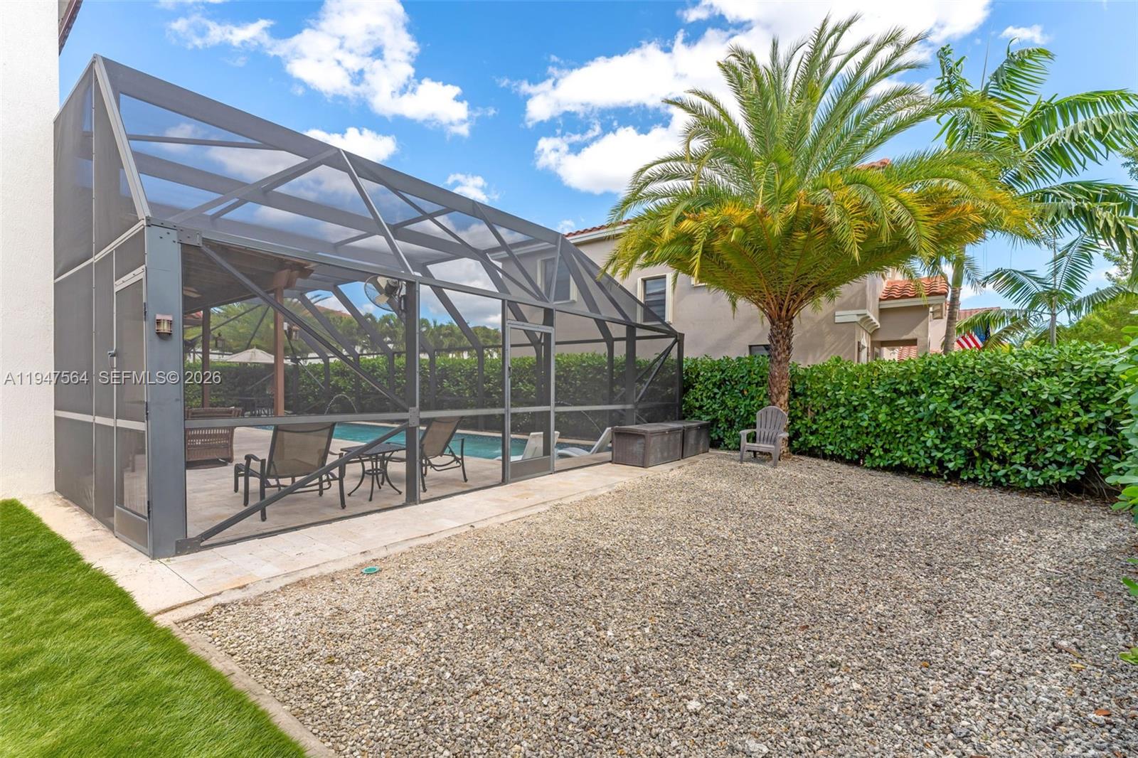 17475 Southwest 153rd Avenue Miami, FL 33187 - Photo 36 of 46 a view of a backyard with a patio