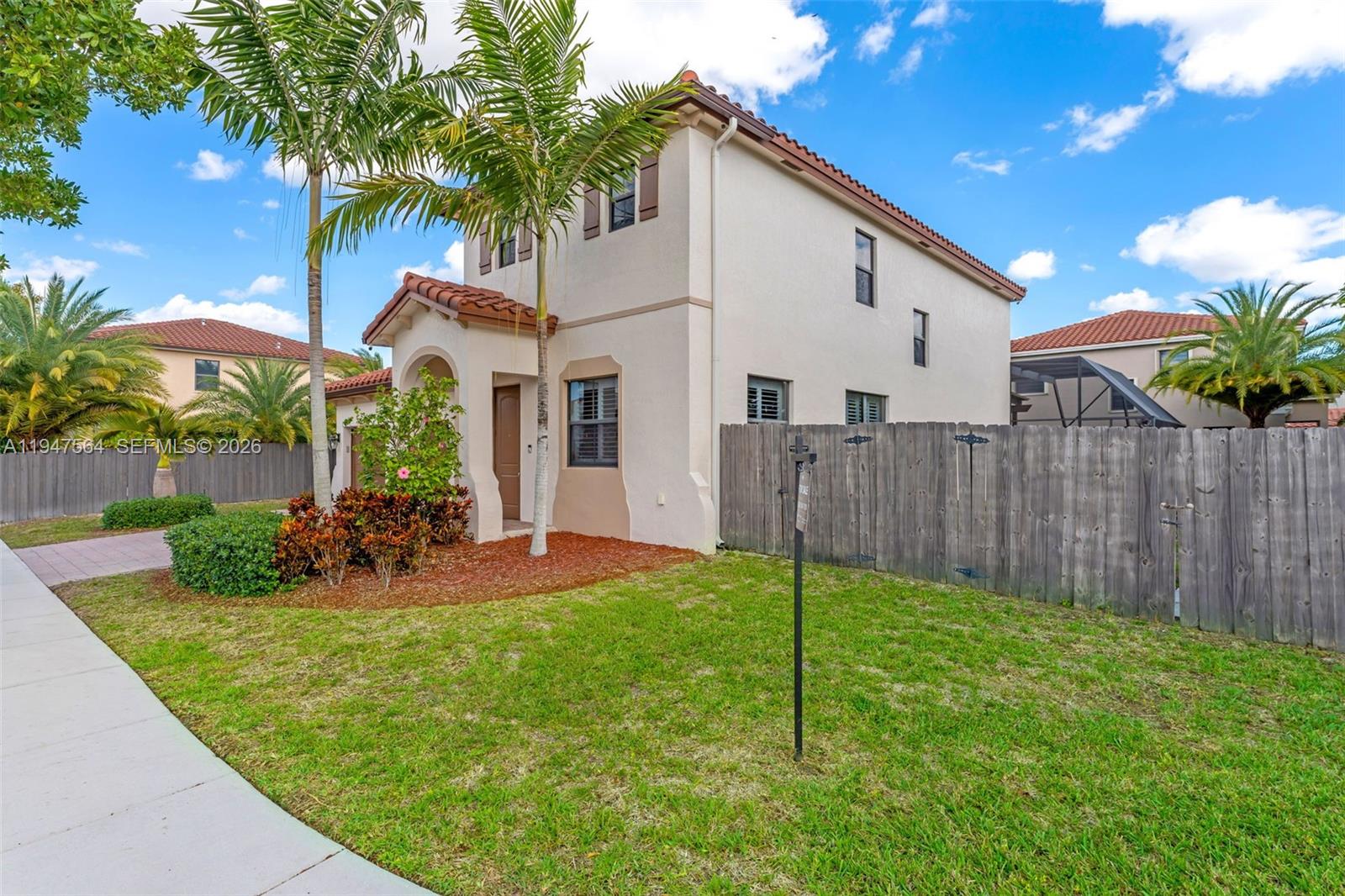 17475 Southwest 153rd Avenue Miami, FL 33187 - Photo 44 of 46 a view of a house with backyard and sitting area