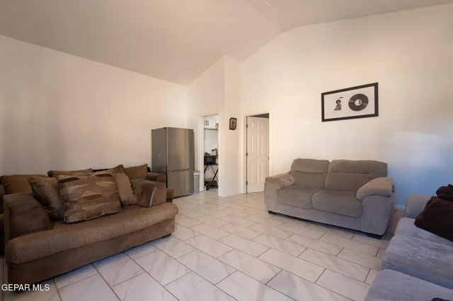a kitchen with a stove top oven and cabinets