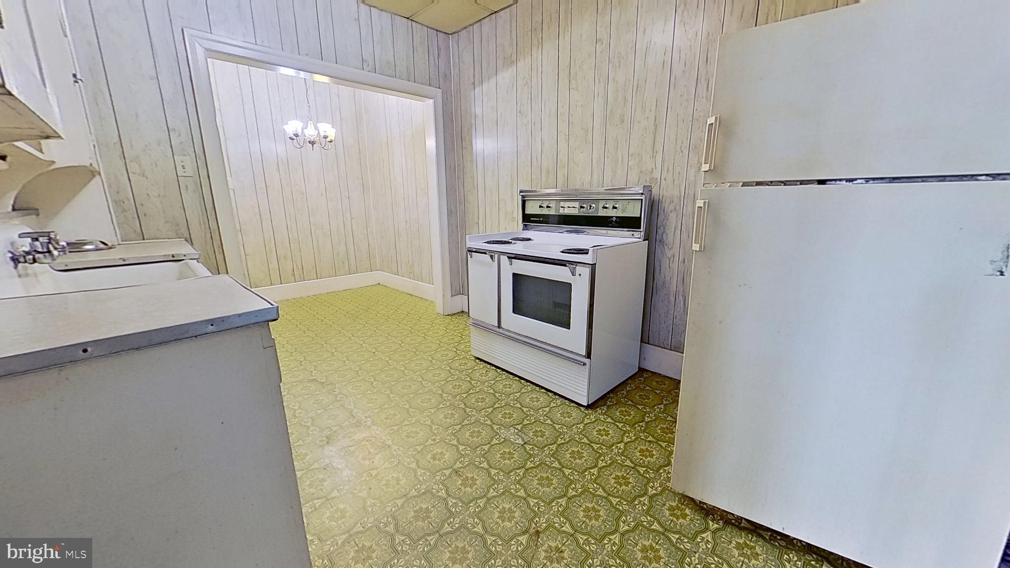 17 East Main Street, Unit 4 Dallastown, PA 17313 - Photo 2 of 8 a kitchen with a sink and a stove top oven