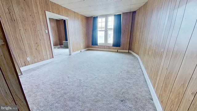 a view of a hallway with closet area