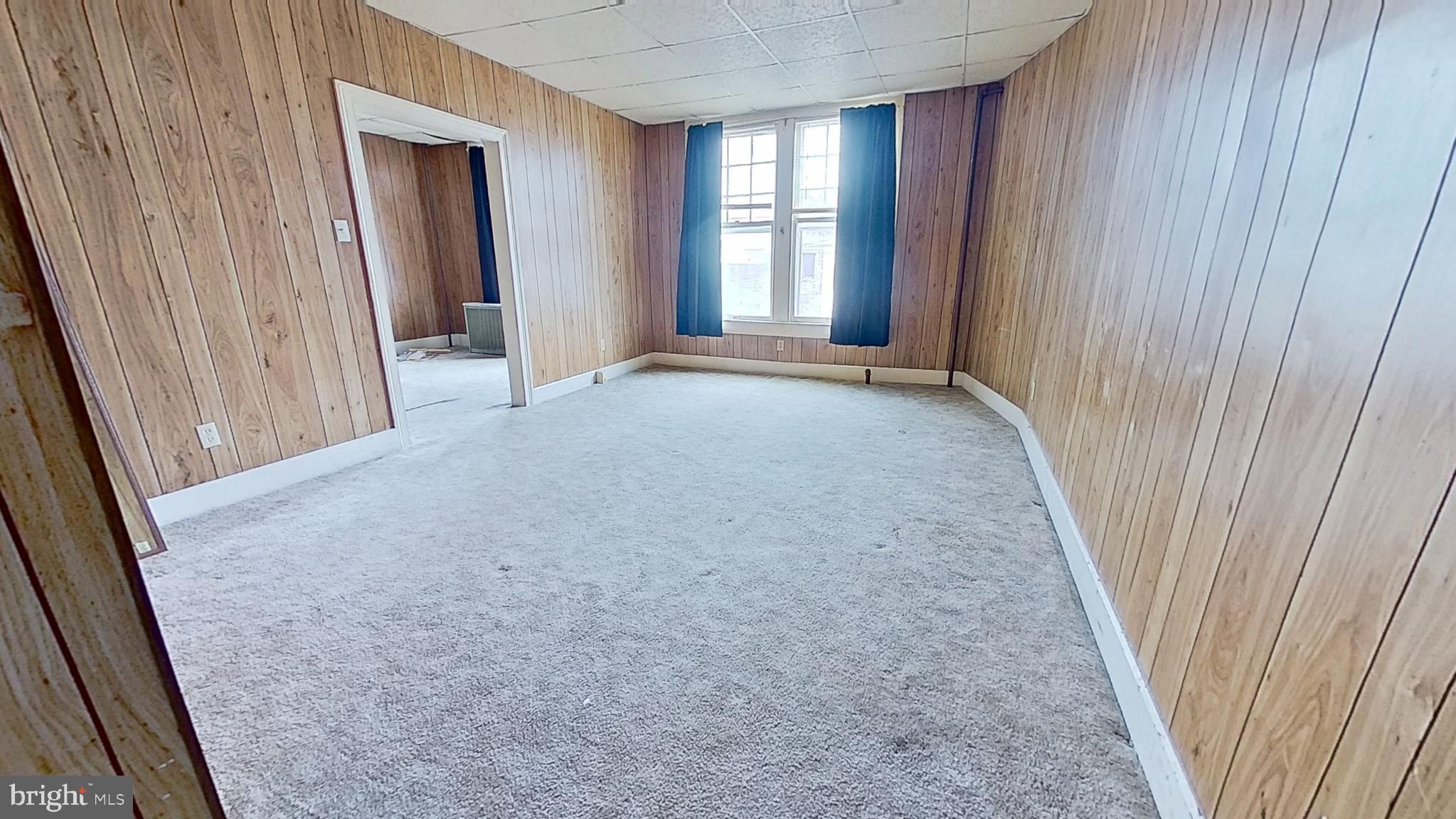17 East Main Street, Unit 4 Dallastown, PA 17313 - Photo 6 of 8 a view of a livingroom with an entryway