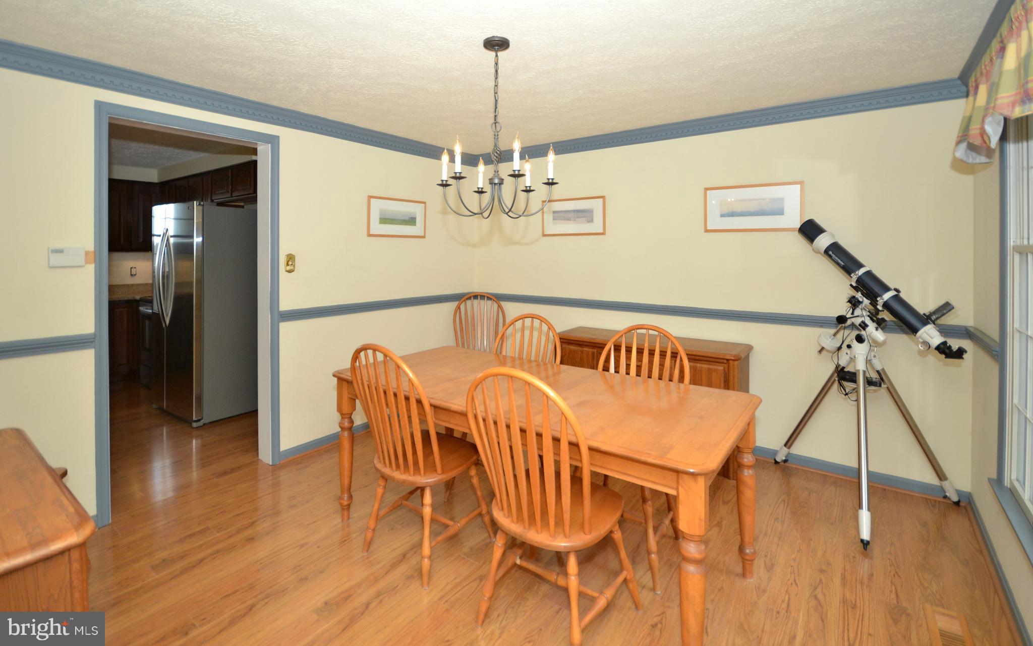 2905 Anderson Road White Hall, MD 21161 - Photo 13 of 26 Dining room opens to kitchen for entertaining