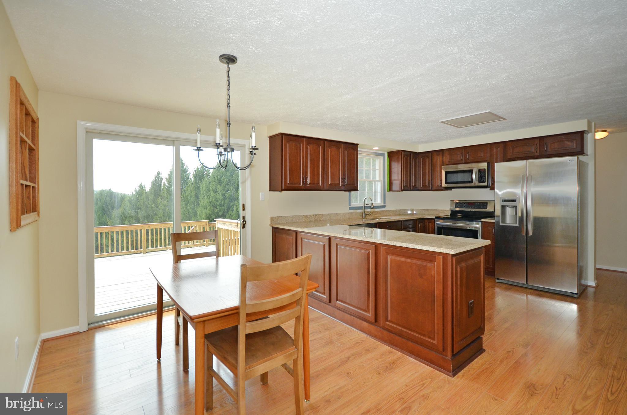 2905 Anderson Road White Hall, MD 21161 - Photo 3 of 26 Bright, updated kitchen leads to expansive, deck!