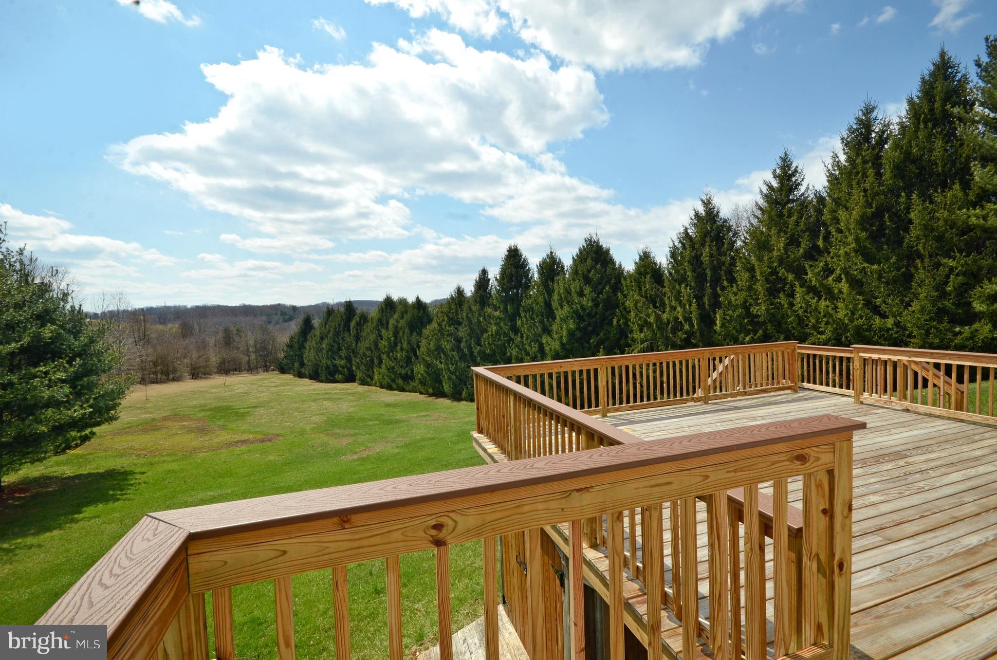 2905 Anderson Road White Hall, MD 21161 - Photo 24 of 26 Large two level deck with stairs to yard and pool