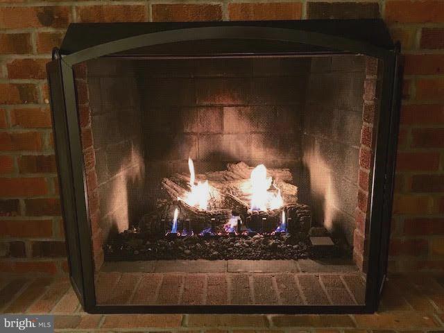 2905 Anderson Road White Hall, MD 21161 - Photo 8 of 26 Realistic gas log fireplace with remote included!