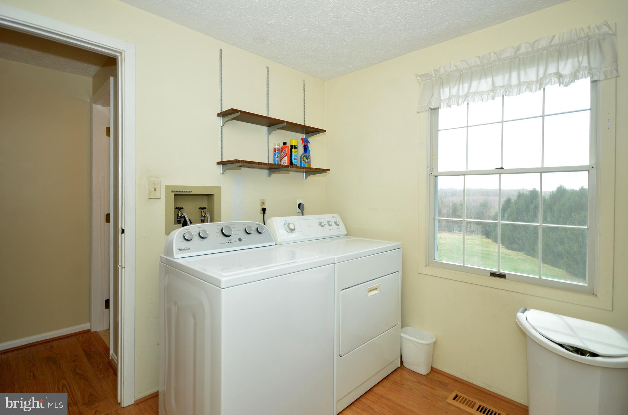 2905 Anderson Road White Hall, MD 21161 - Photo 10 of 26 Main floor laundry room with built-in cabinet