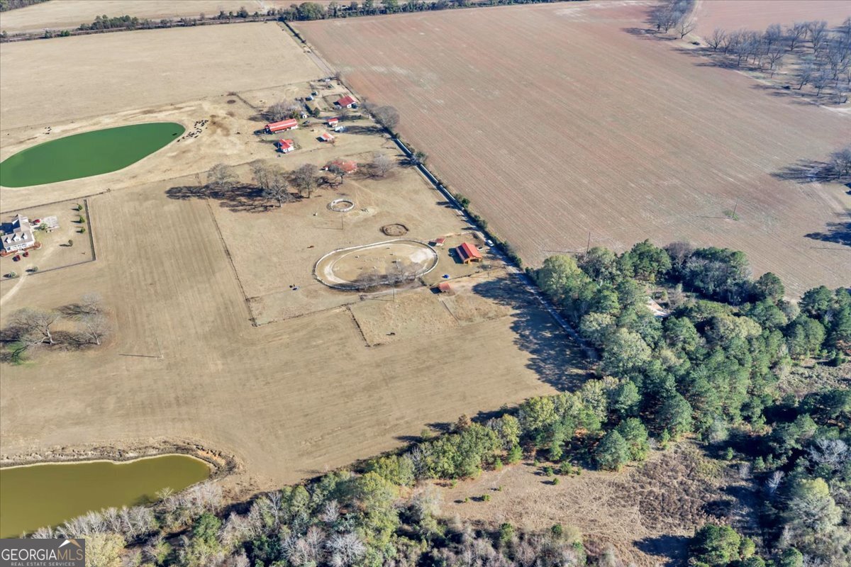 0 Sandbed Road Kathleen, GA 31047 - Photo 16 of 68 an aerial view of a house with a yard and lake view