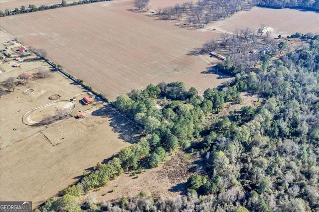 an aerial view of beach and ocean