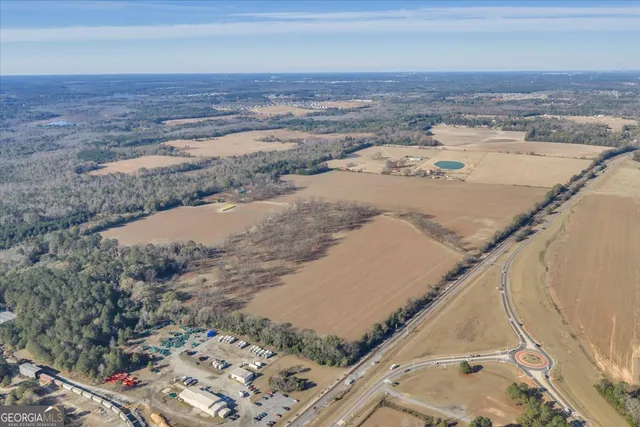 a view of a lake in front of a building