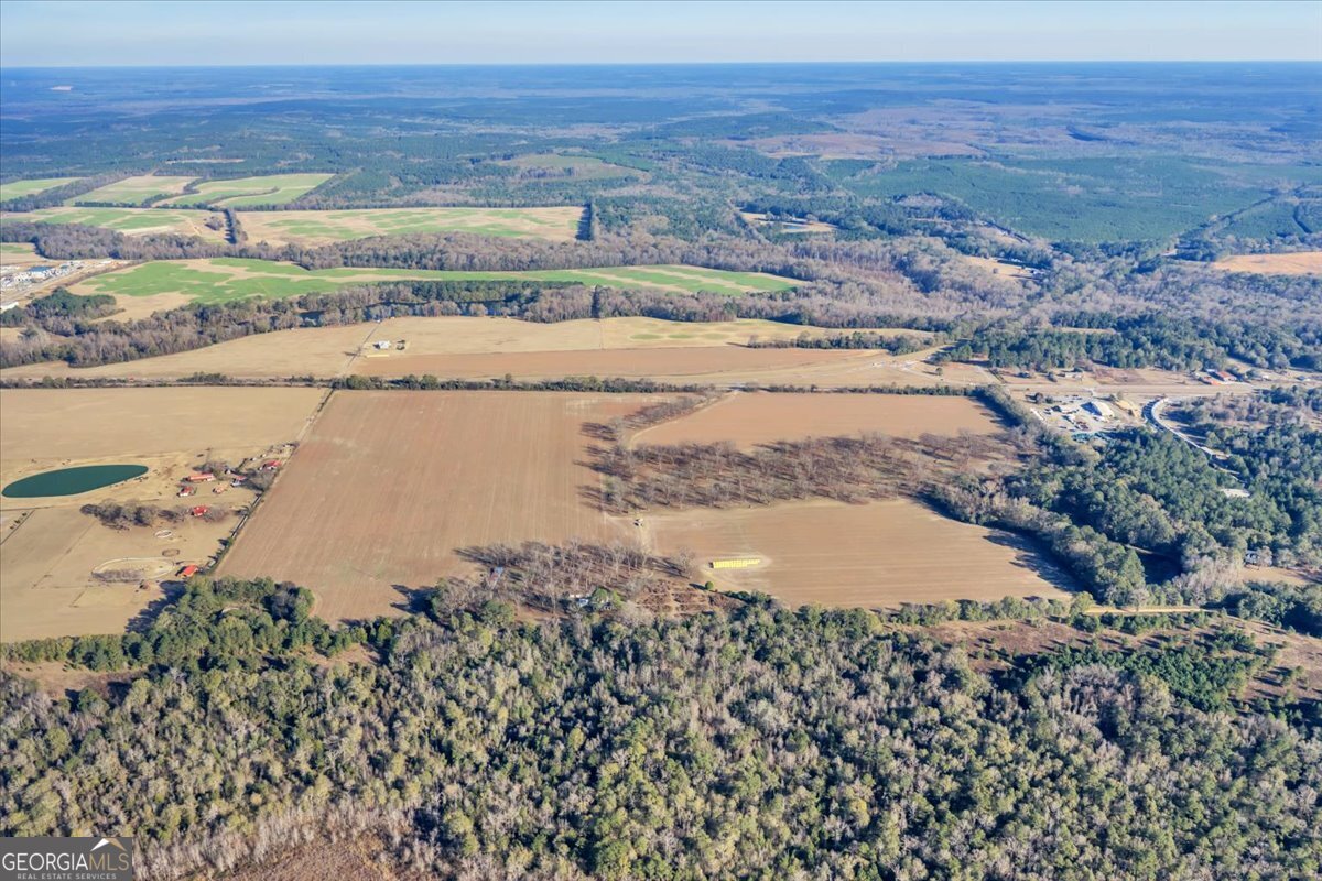 0 Sandbed Road Kathleen, GA 31047 - Photo 49 of 68 a view of an ocean beach and mountain