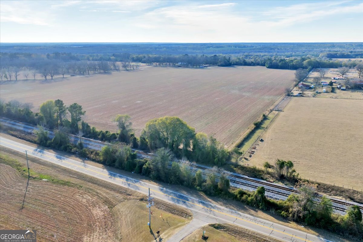 0 Sandbed Road Kathleen, GA 31047 - Photo 53 of 68 an aerial view of a house with a yard and lake view