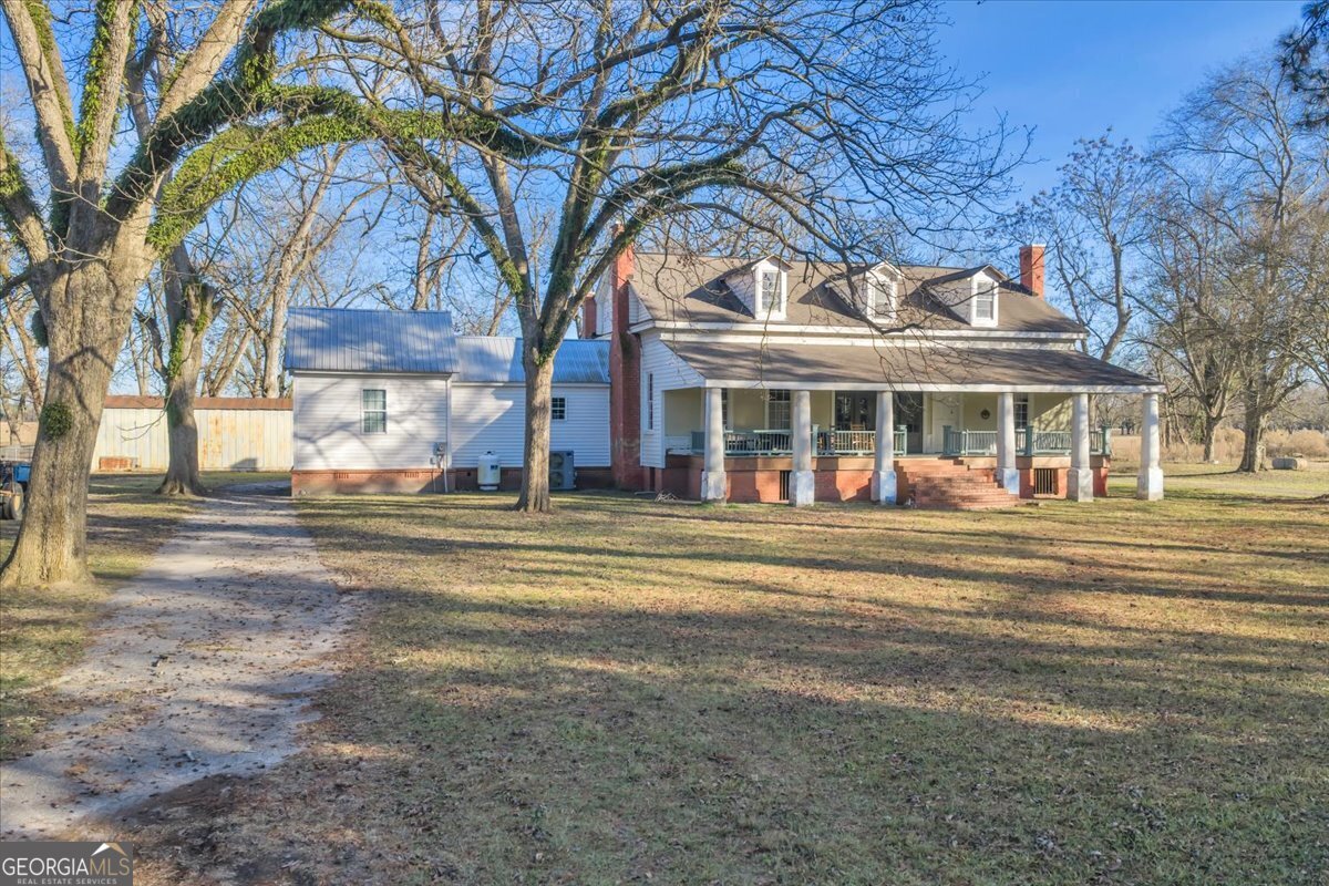 0 Sandbed Road Kathleen, GA 31047 - Photo 67 of 68 a front view of a house with a large trees