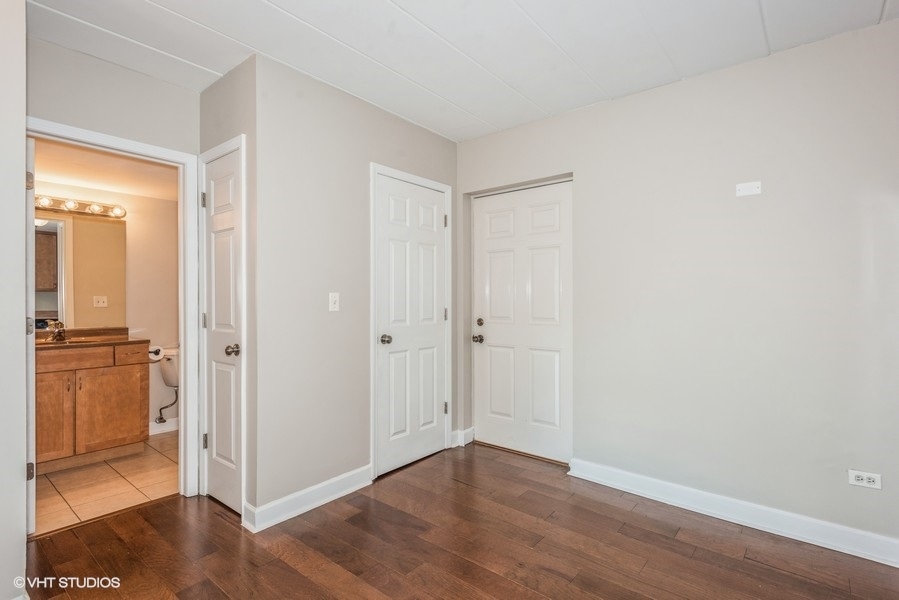 1000 South Lorraine Road, Unit 307 Wheaton, IL 60189 - Photo 5 of 10 a view of a bathroom with wooden floor