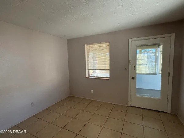 a view of an empty room with window