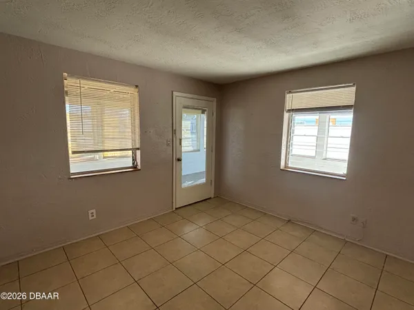 a kitchen with a stove and a microwave