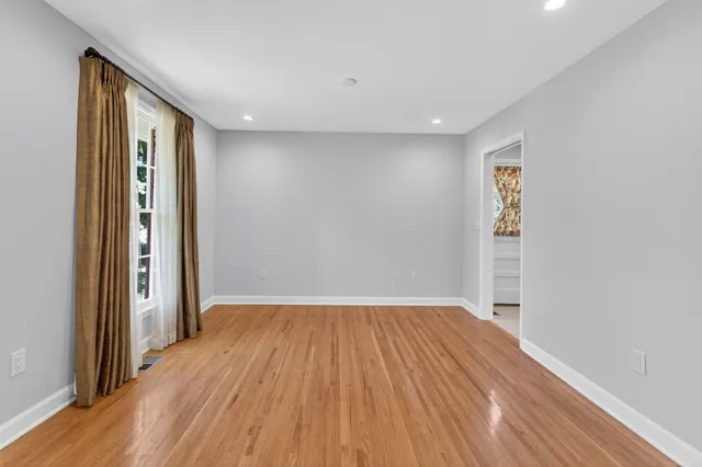 a kitchen with stainless steel appliances granite countertop a stove sink and microwave
