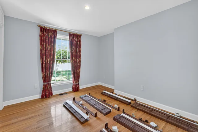 a bathroom with a sink toilet and a mirror