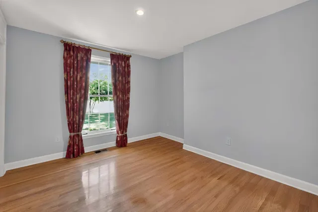 a bathroom with a sink a shower and a mirror