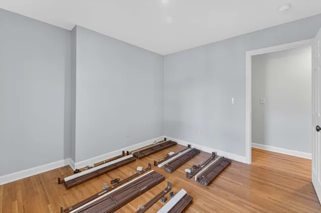 a view of empty room with windows