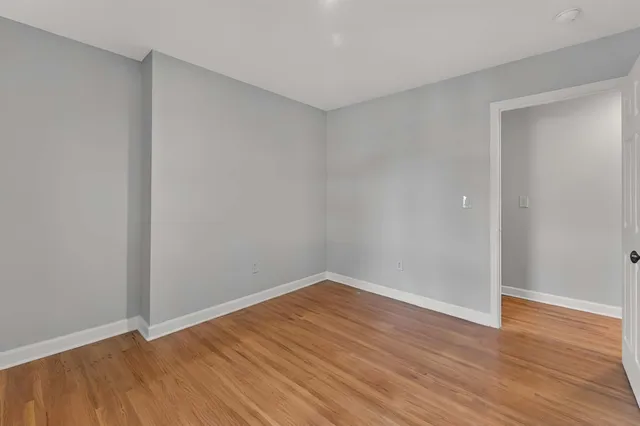 a view of a room with a large window