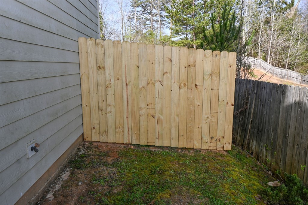 4447 Walking Stick Way Columbus, GA 31907 - Photo 8 of 26 a view of a backyard with wooden fence
