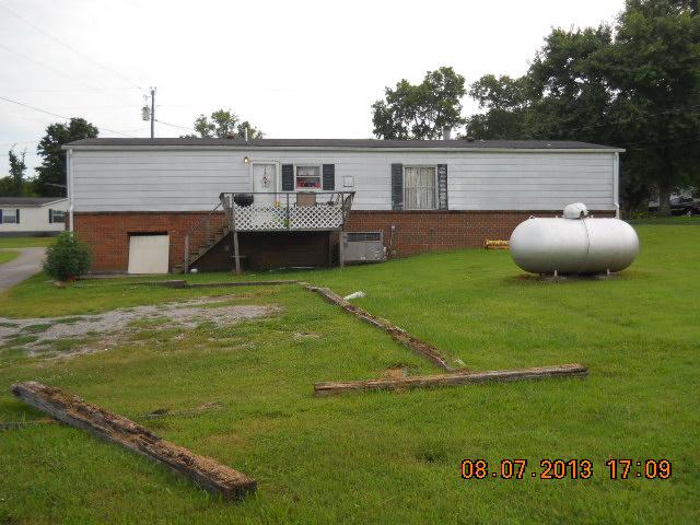 405 Thomas Road Lebanon, TN 37087 - Photo 8 of 12 a view of a house with a backyard