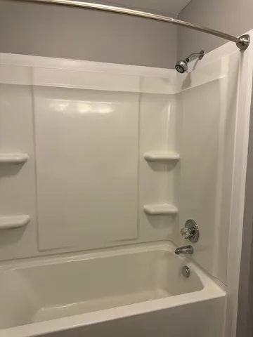 a bathroom with a bathtub